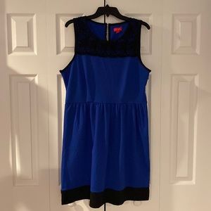 Elle dress in size 16. Blue with black lace neckline